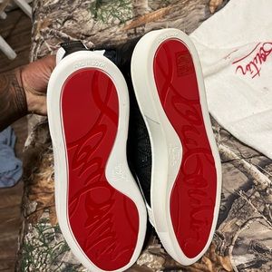 Christian Louboutin black white they is red bottoms